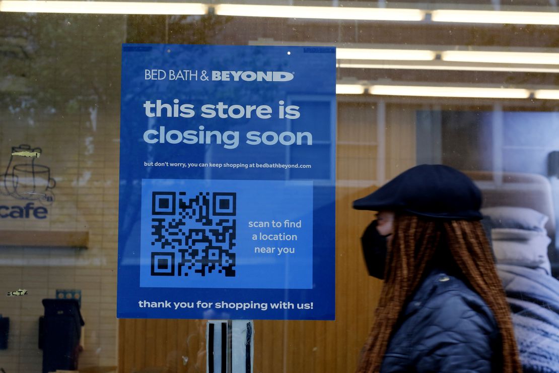 A woman walks near a closed store of Bed Bath & Beyond on April 24, 2023 in New York City. Bed Bath & Beyond filed for bankruptcy protection after the struggling failed to secure enough founds to stay open.