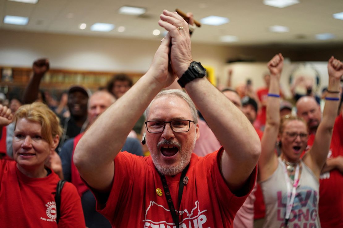 People react as the result of a vote comes in favour of the hourly factory workers at Volkswagen's assembly plant to join the United Auto Workers (UAW) union, at a watch party in Chattanooga, Tennessee, U.S., April 19, 2024.