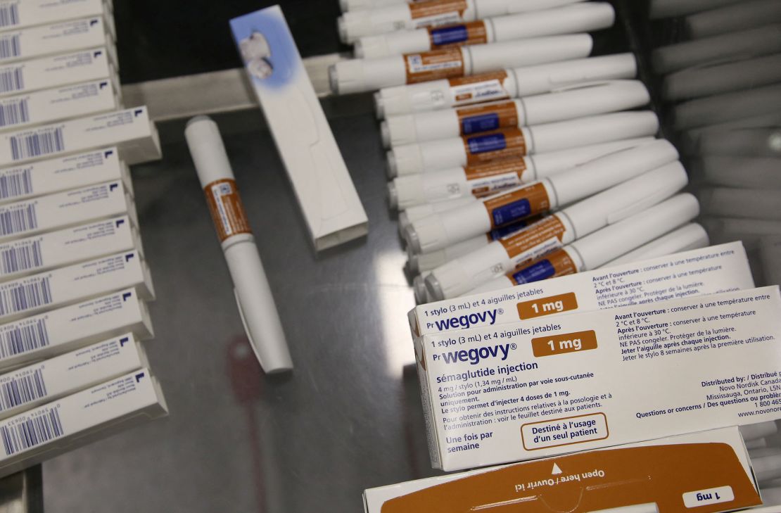 Boxes of Wegovy lie beside a packaging line at Novo Nordisk's facility in Hillerod, Denmark, March 8, 2024.