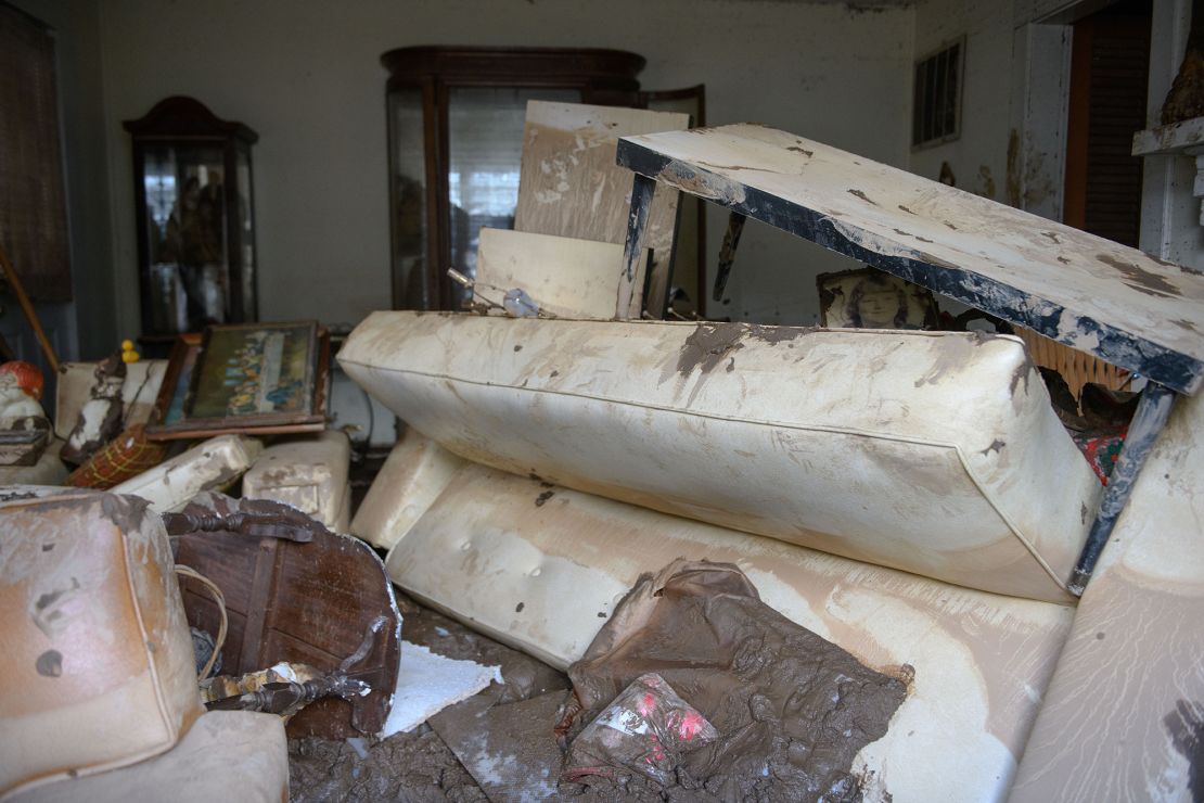 Residents' belongings are seen in a flooded home on October 2, 2024 in Swannanoa, North Carolina.